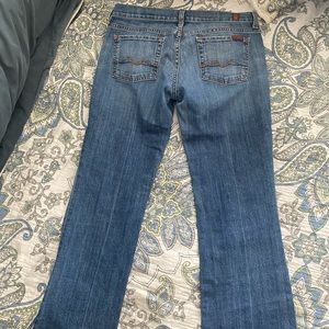 7 for All Mankind medium wash bootcut jeans